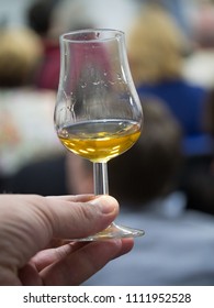 Hand Holding A Snifter Glass Filled With Whisky, Whisky Tasting Event