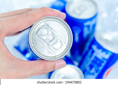 Hand Holding Soda Can