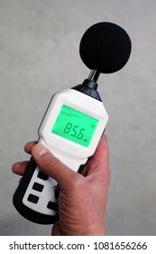 Hand Holding Sound Level Meter