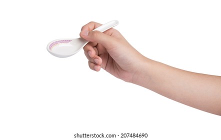 Hand Holding Soup Spoon Isolated On White Background.  