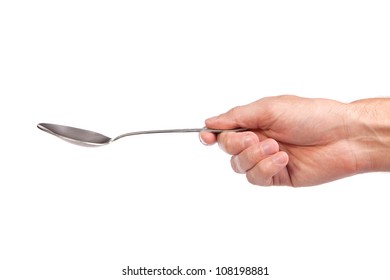 Hand Is Holding A Spoon Isolated On A White Background