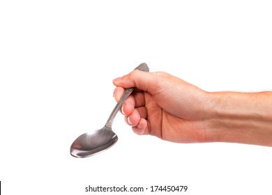 Hand Is Holding A Spoon Isolated On A White Background