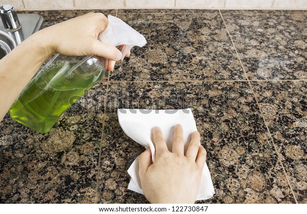 Hand Holding Spray Bottle Clean Stone Stock Photo Edit Now 122730847