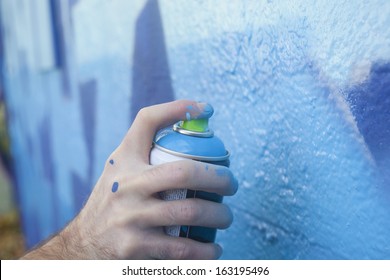 Hand Holding A Spray Paint Can