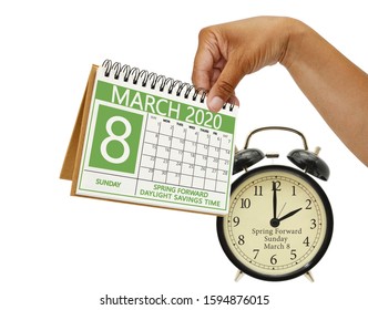 Hand Holding Spring Forward Daylight Savings Time March 8 Calendar White Background