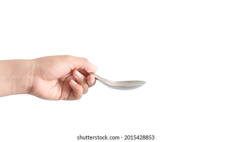 Hand Holding Stainless Steel Soup Spoon Isolated On White Background.