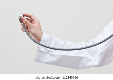 Hand Holding Stethoscope On Clear Background