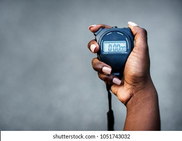 Hand Holding A Stopwatch