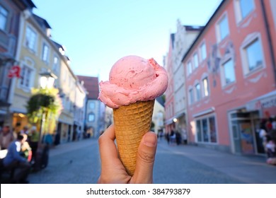 Hand Holding Strawberry Ice Cream