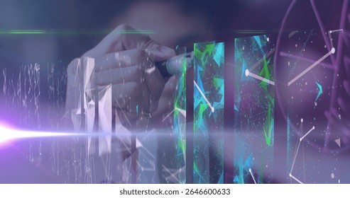 Hand holding stylus pen manipulating network nodes on panels in workspace, holographic beams. Futuristic, digital, interface, technology, holographic, network, innovation