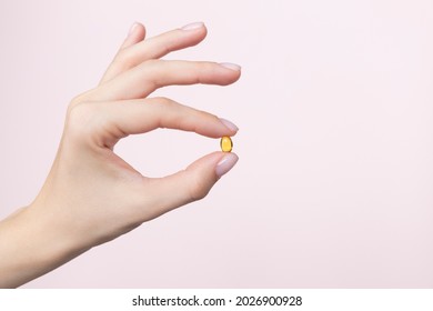 Hand holding the supplements. High quality photo