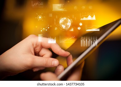 Hand holding tablet with global business concept