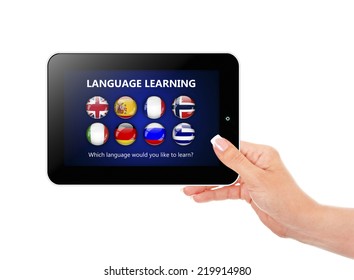 hand holding tablet with language learning page over white background