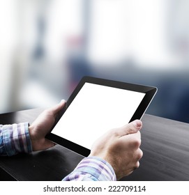 Hand Holding Tablet In Office