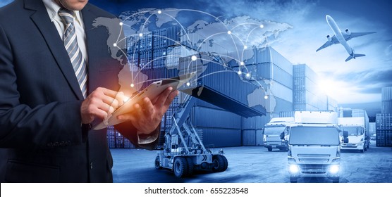 Hand holding tablet is pressing button on touch screen interface in front Logistics Industrial Container Cargo freight ship for Concept of fast or instant shipping, Online goods orders worldwide - Shutterstock ID 655223548