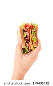 Hand Holding Tasty Sandwich. Isolated On A White Background.