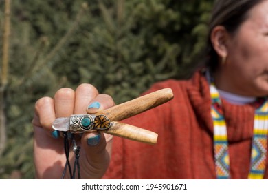 hand holding tobacco pipe snuff ancestral medicine