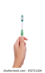 Hand Holding Toothbrush