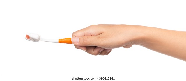 Hand Holding Toothbrush With Toothpaste Isolated On White Background