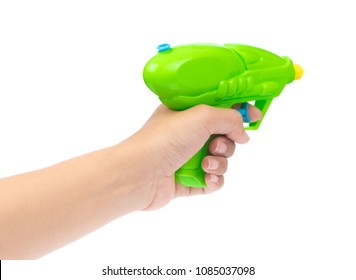 Hand Holding Toy Plastic Water Gun Isolated On White Background