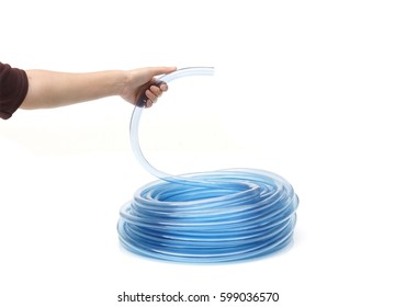 Hand Holding Transparent Plastic Water Hose Isolated                                    