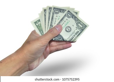 Hand holding us dollar on white background