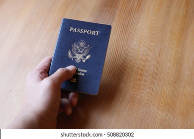 Hand Holding U.S. Passport