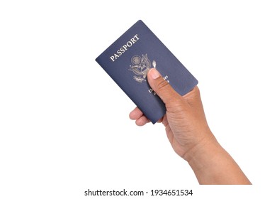 Hand Holding US Passport On White Background