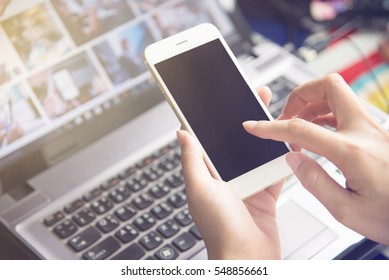 hand holding using mobile phone.girl using smart phone. - Shutterstock ID 548856661