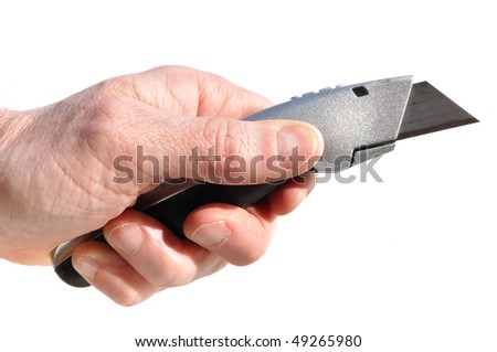 Hand Holding a Utility Knife (Box Cutter)