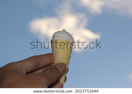 Similar – Child holds ice cream Ice