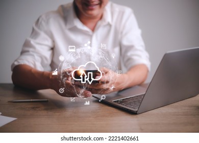 Hand holding virtual cloud computing with world and technology item such as upload download. Cloud technology management big data include business strategy , customer.