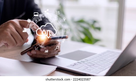 Hand holding virtual cloud computing with world and technology item such as upload download. Cloud technology management big data include business strategy , customer.