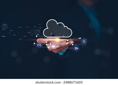 Hand holding virtual cloud computing interface with data and technology icons. Concept of cloud storage and data management. Design for print and web