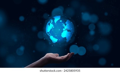 Hand holding virtual earth global network technology with bokeh in background, blue light effect 