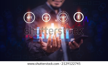 Hand holding visual screen graph chart digital technology and Trader online trading investment for cryptocurrency money and bitcoins using data in blockchain  