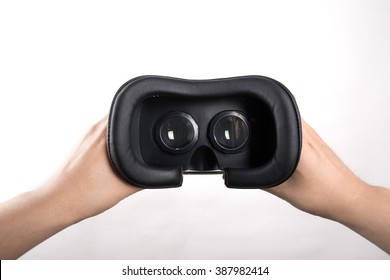 Hand Holding VR Glasses