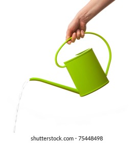 hand holding watering can isolated