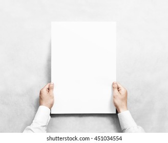 Hand Holding White Blank Poster Mockup, Isolated. Arm In Shirt Hold Clear Broadsheet Template Mock Up. Affiche Bill Surface Design. Broadside Pure Print Display Show. Sticking A3 Poster On The Wall.