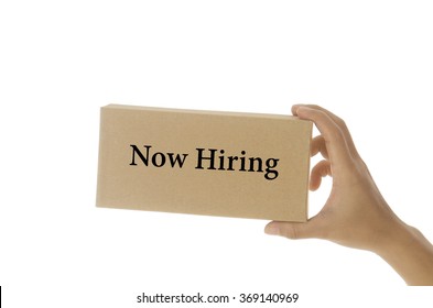 hand holding white card written now hiring over white background - Shutterstock ID 369140969