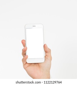 Hand holding white phone isolated on white clipping path inside. Top view.Mock up.Copy space.Template.Blank. - Shutterstock ID 1122129764