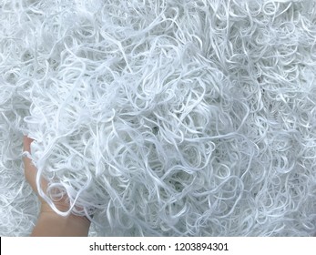 Hand holding White Polyester FDY Yarn  ,Polyester Filament Yarn.