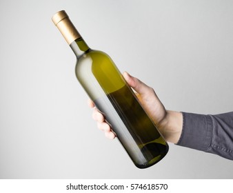 Hand Is Holding Wine Bottle