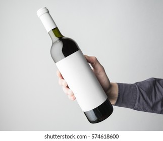 Hand Is Holding Wine Bottle