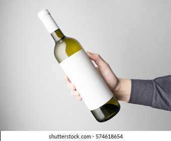 Hand Is Holding Wine Bottle