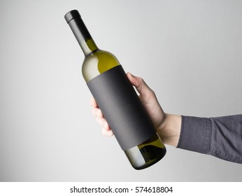 Hand Is Holding Wine Bottle