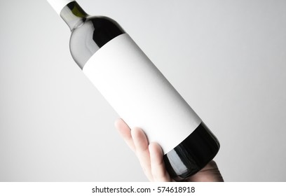 Hand Is Holding Wine Bottle/Close-up