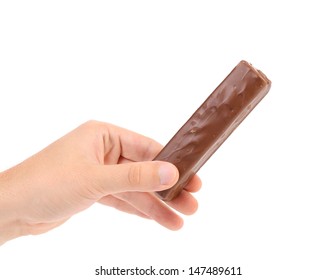 Hand Holds Bar Of Chocolate.