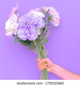 Hand Holds A Bouquet. Purple Monochrome Aesthetic Minimal Design