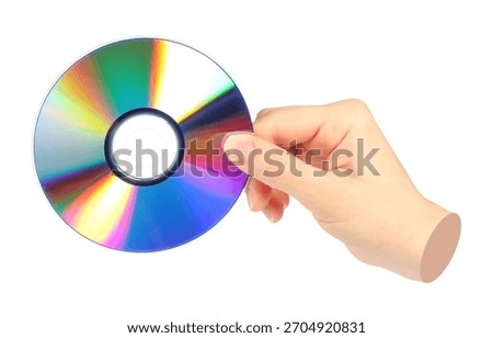 Hand holds cd compact disk, isolated on transparent background, retro teachnology concept. Contemporary art design